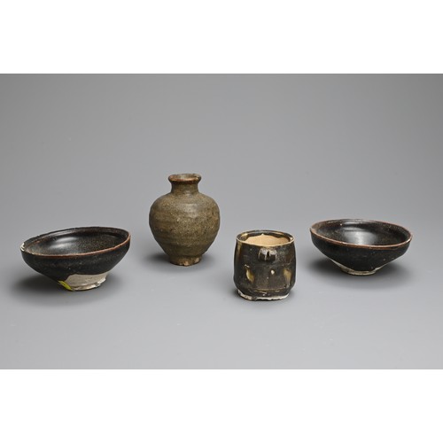 181 - A GROUP OF CHINESE BROWN GLAZED POTTERY ITEMS, 12/13TH CENTURY. To include a rare bird feeder with d... 