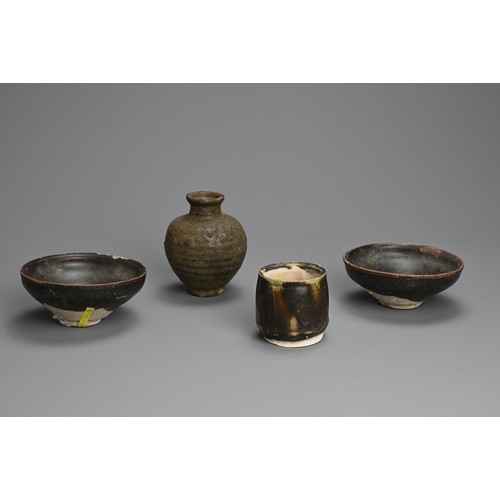 181 - A GROUP OF CHINESE BROWN GLAZED POTTERY ITEMS, 12/13TH CENTURY. To include a rare bird feeder with d... 