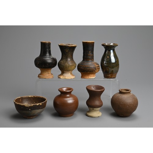 182 - A GROUP OF CHINESE BROWN GLAZED POTTERY JARS AND BOWL, 12TH CENTURY AND LATER. To include five vases... 