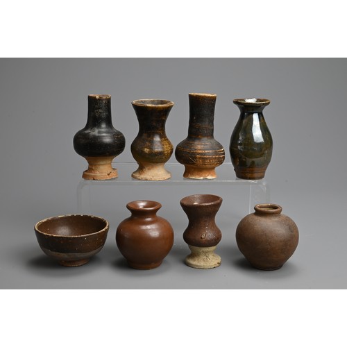 182 - A GROUP OF CHINESE BROWN GLAZED POTTERY JARS AND BOWL, 12TH CENTURY AND LATER. To include five vases... 