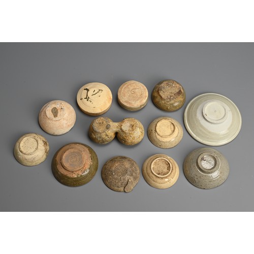 188 - A MIXED GROUP OF CHINESE PORCELAIN STONEWARE DISHES AND POTS, 12 - 16TH CENTURY. To include a conjoi... 