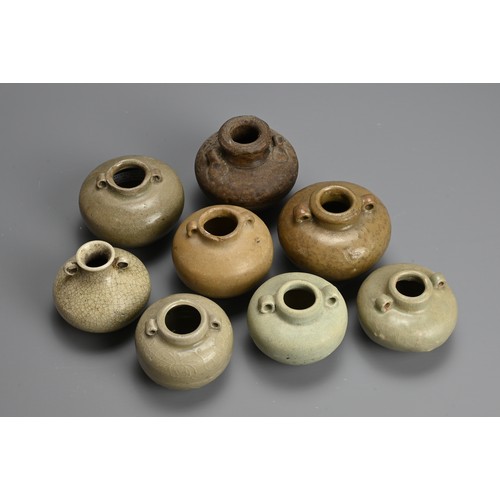 193 - A GROUP OF CHINESE AND SOUTHEAST ASIAN JARLETS, 14/15TH CENTURY. Each of globular form with handles ... 