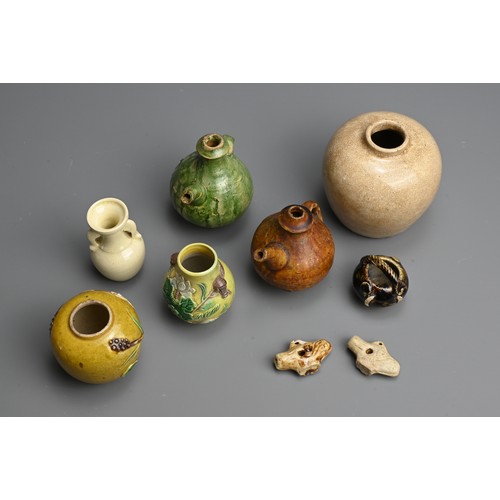 194 - A MIXED GROUP OF CHINESE CERAMIC ITEMS, TANG DYNASTY AND LATER. To include two glazed pendant whistl... 