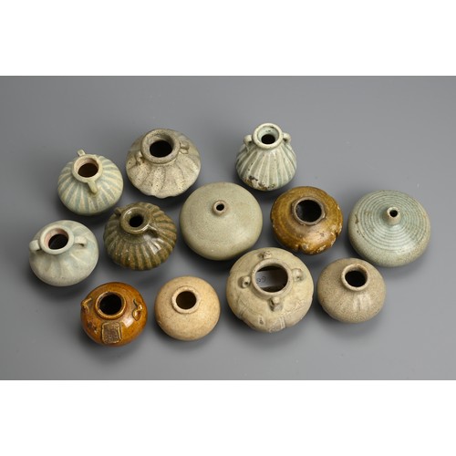 198 - A GROUP OF THAI CERAMIC STONEWARE JARS, 14/16TH CENTURY. Mainly Sawankhalok wares of various forms t... 