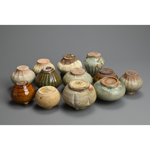 198 - A GROUP OF THAI CERAMIC STONEWARE JARS, 14/16TH CENTURY. Mainly Sawankhalok wares of various forms t... 