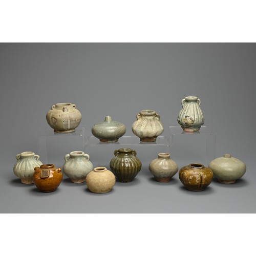 198 - A GROUP OF THAI CERAMIC STONEWARE JARS, 14/16TH CENTURY. Mainly Sawankhalok wares of various forms t... 