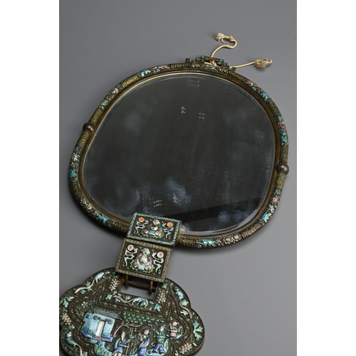 207 - A LARGE CHINESE ENAMEL ON COPPER HANGING MIRROR, LATE QING DYNASTY. Bordered with Shou characters an... 