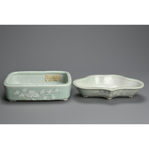 213 - TWO CHINESE SLIP DECORATED CELADON GROUND PORCELAIN NARCISSUS BOWLS, 19TH CENTURY. of lobbed and rec... 