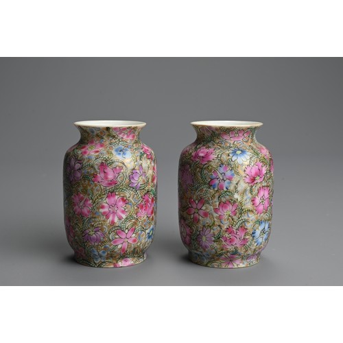 224 - A PAIR OF CHINESE FAMILLE ROSE MILLEFLEUR MINIATURE PORCELAIN VASES, 19/20TH CENTURY. Finely potted ... 