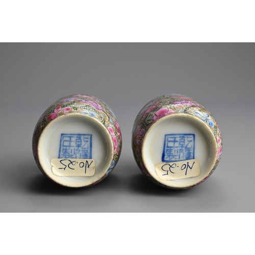 224 - A PAIR OF CHINESE FAMILLE ROSE MILLEFLEUR MINIATURE PORCELAIN VASES, 19/20TH CENTURY. Finely potted ... 