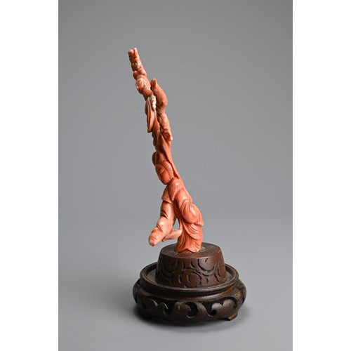 233 - A CHINESE CARVED RED CORAL FIGURE, 19/20TH CENTURY. In the form of branches with two ladies mounted ... 