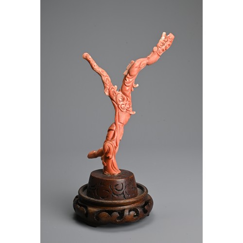 233 - A CHINESE CARVED RED CORAL FIGURE, 19/20TH CENTURY. In the form of branches with two ladies mounted ... 