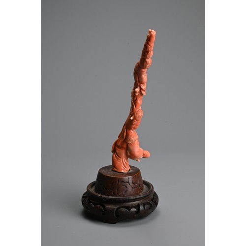 233 - A CHINESE CARVED RED CORAL FIGURE, 19/20TH CENTURY. In the form of branches with two ladies mounted ... 