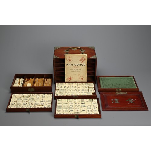 236 - A CHINESE BOXED MAHJONG SET, EARLY 20TH CENTURY. A complete set with tiles, counters, instructional ... 