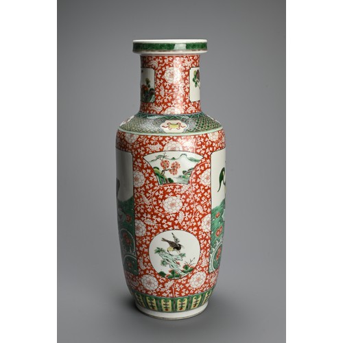 240 - A LARGE CHINESE FAMILLE VERTE PORCELAIN ROULEAU VASE, LATE QING DYNASTY. Decorated with panels of qi... 