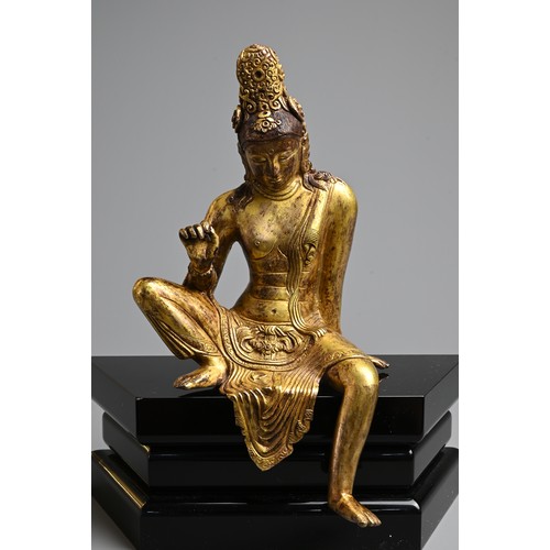 247 - A FINE GILT BRONZE FIGURE OF BODHISATTVA, PROBABLY NEPALESE, 18TH CENTURY. Heavily cast, seated in R... 