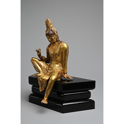 247 - A FINE GILT BRONZE FIGURE OF BODHISATTVA, PROBABLY NEPALESE, 18TH CENTURY. Heavily cast, seated in R... 