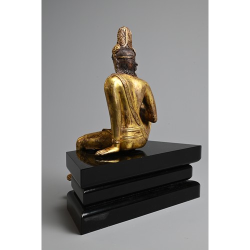 247 - A FINE GILT BRONZE FIGURE OF BODHISATTVA, PROBABLY NEPALESE, 18TH CENTURY. Heavily cast, seated in R... 