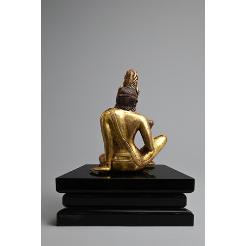 247 - A FINE GILT BRONZE FIGURE OF BODHISATTVA, PROBABLY NEPALESE, 18TH CENTURY. Heavily cast, seated in R... 