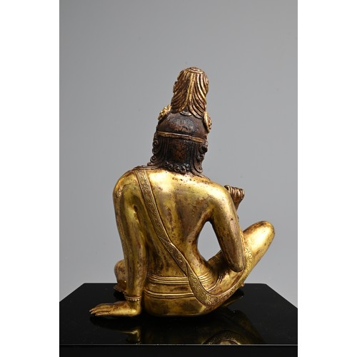 247 - A FINE GILT BRONZE FIGURE OF BODHISATTVA, PROBABLY NEPALESE, 18TH CENTURY. Heavily cast, seated in R... 