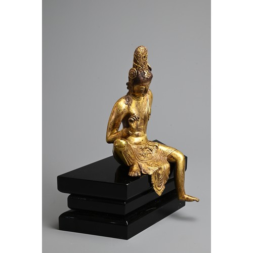 247 - A FINE GILT BRONZE FIGURE OF BODHISATTVA, PROBABLY NEPALESE, 18TH CENTURY. Heavily cast, seated in R... 