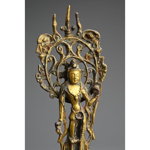 250 - A CHINESE GILT BRONZE FIGURE OF BODHISATTVA WITH A BURMESE FIGURE. The bodhisattva standing in the T... 