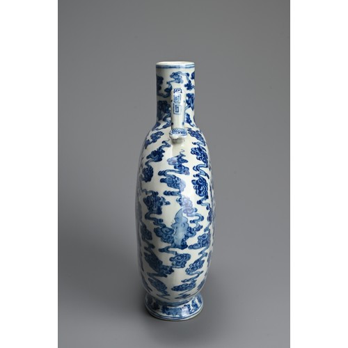 313 - A CHINESE BLUE AND WHITE PORCELAIN MOONFLASK, QIANLONG MARK. With curved ruyi handles decorated with... 