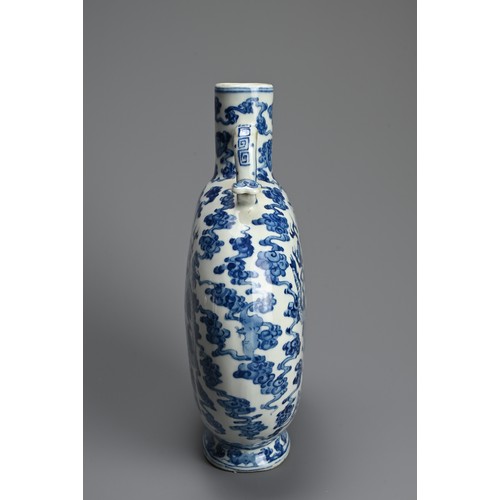 313 - A CHINESE BLUE AND WHITE PORCELAIN MOONFLASK, QIANLONG MARK. With curved ruyi handles decorated with... 