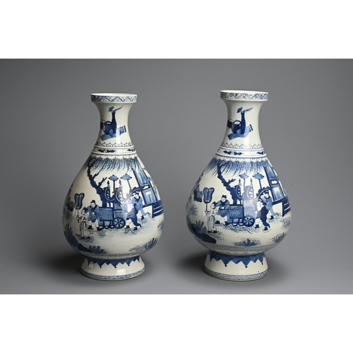 311 - A LARGE NEAR PAIR OF CHINESE BLUE AND WHITE PORCELAIN VASES, 20TH CENTURY. Of pear shape on a tall s... 