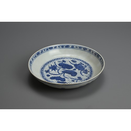 68 - A CHINESE BLUE AND WHITE PORCELAIN DISH, LATE MING DYNASTY. Decorated with ducks in a lotus pond, wi... 