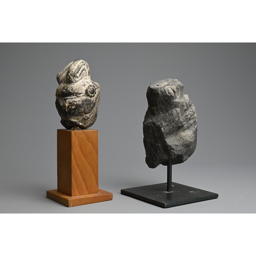 261 - TWO CHINESE CARVED GREY STONE HEADS OF GUANYIN. Each with headdress mounted on later display stands.... 