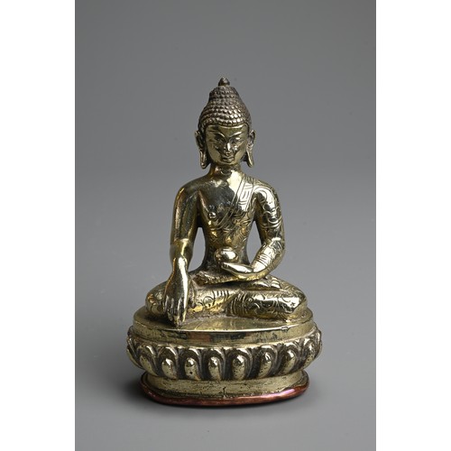 264 - A TIBETAN POLISHED BRONZE AND COPPER FIGURE OF BUDDHA, 19/20TH CENTURY. The figure seated on a lotus... 