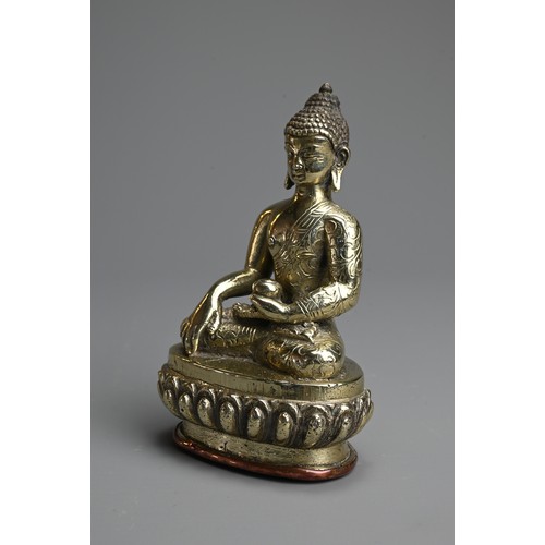 264 - A TIBETAN POLISHED BRONZE AND COPPER FIGURE OF BUDDHA, 19/20TH CENTURY. The figure seated on a lotus... 