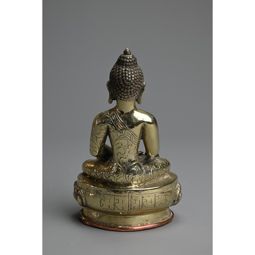 264 - A TIBETAN POLISHED BRONZE AND COPPER FIGURE OF BUDDHA, 19/20TH CENTURY. The figure seated on a lotus... 