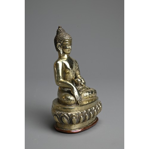 264 - A TIBETAN POLISHED BRONZE AND COPPER FIGURE OF BUDDHA, 19/20TH CENTURY. The figure seated on a lotus... 