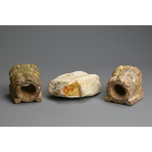 269 - TWO EARLY ASIAN HARDSTONE FITTINGS AND BOULDER. The fittings of Taotie mask form with cylindrical op... 