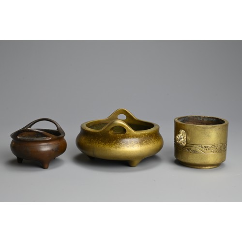 275 - THREE CHINESE BRONZE CENSERS, 19/20TH CENTURY. The largest of circular form with raised handles and ... 