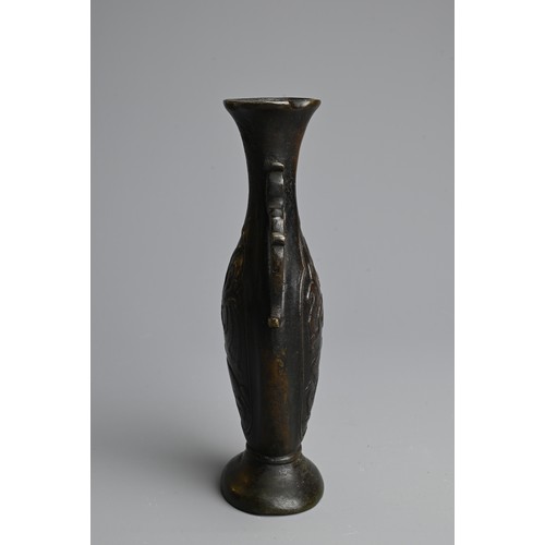 276 - A CHINESE BRONZE VASE, 17/18TH CENTURY. Of flattened baluster form with quatre lobed rim, with slend... 