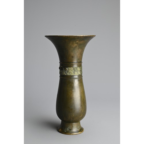 278 - A CHINESE BRONZE VASE, 18/19TH CENTURY. With flared mouth decorated to the body with a single band f... 