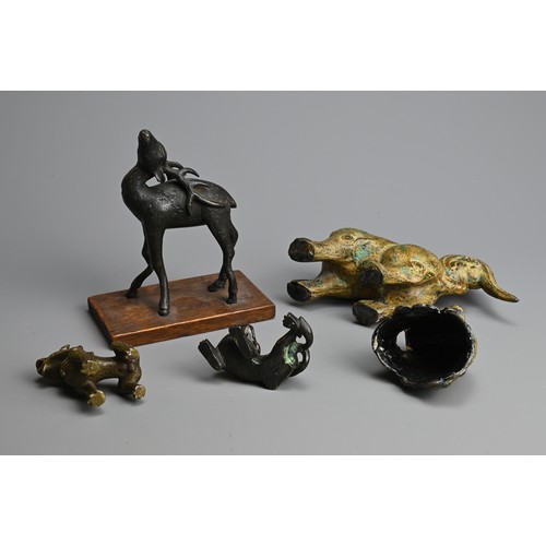 283 - A GROUP OF CHINESE BRONZE ITEMS, QING DYNASTY AND LATER. To include a model of a deer with its head ... 