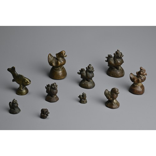 287 - A GROUP OF BURMESE BRONZE OPIUM WEIGHTS, 19TH CENTURY. In the form of Hintha Duck, Chinthe, elephant... 