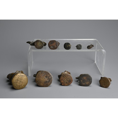 287 - A GROUP OF BURMESE BRONZE OPIUM WEIGHTS, 19TH CENTURY. In the form of Hintha Duck, Chinthe, elephant... 