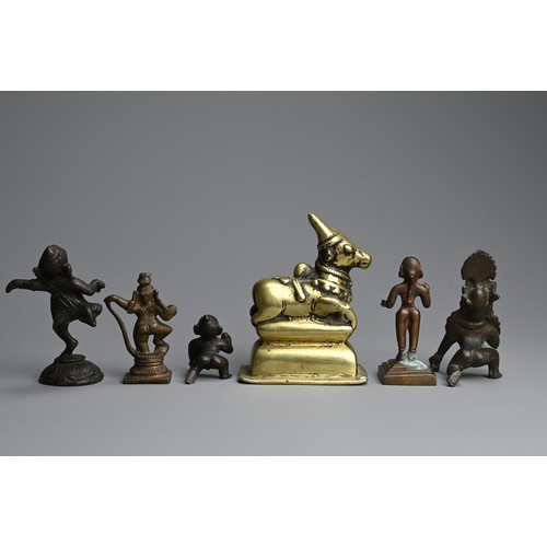 290 - A GROUP OF INDIAN / SOUTH EAST ASIAN BRONZE IDOLS, 19/20TH CENTURY. Of various forms to include a po... 