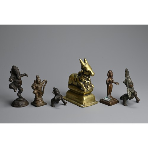 290 - A GROUP OF INDIAN / SOUTH EAST ASIAN BRONZE IDOLS, 19/20TH CENTURY. Of various forms to include a po... 