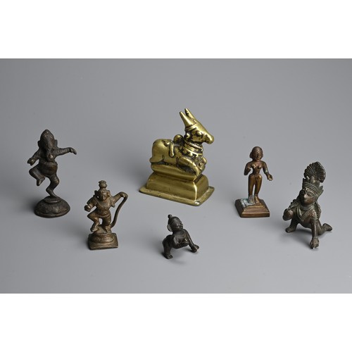 290 - A GROUP OF INDIAN / SOUTH EAST ASIAN BRONZE IDOLS, 19/20TH CENTURY. Of various forms to include a po... 