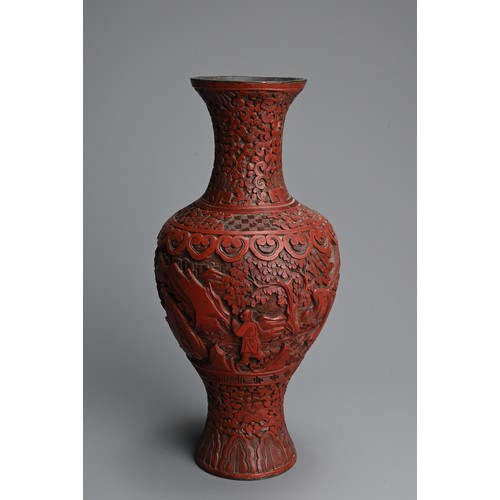 294 - A CHINESE CINNABAR LACQUER VASE, 19TH CENTURY. Of baluster form carved in relief with scholars and a... 