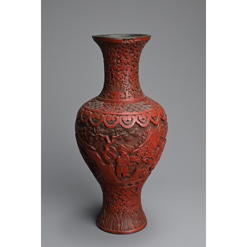 294 - A CHINESE CINNABAR LACQUER VASE, 19TH CENTURY. Of baluster form carved in relief with scholars and a... 