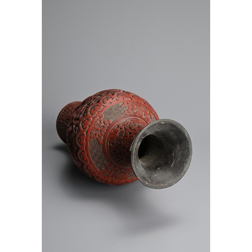 294 - A CHINESE CINNABAR LACQUER VASE, 19TH CENTURY. Of baluster form carved in relief with scholars and a... 