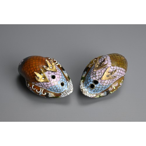 298 - A PAIR OF EARLY 20TH CENTURY CHINESE CLOISONNE ENAMEL MODELS OF QUAILS. Each recumbent, with plumage... 