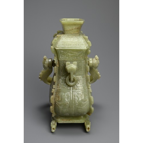 310 - A CHINESE ARCHAIC STYLE CARVED JADE VESSEL, 20TH CENTURY. Modelled on the early wine vessels, You, f... 